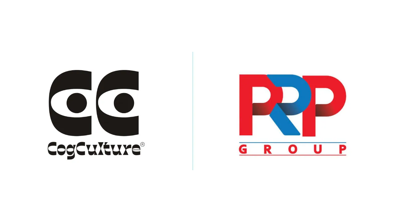 Two interlocking paper cogs beside a microphone, for the Cog Culture partnership with PRP Group on public relations