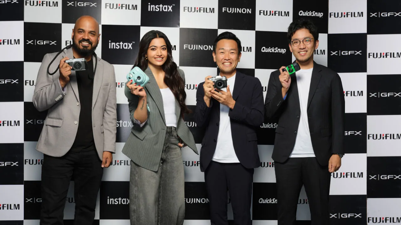 An instant camera and a printed photograph, as halftone cutouts, for Rashmika Mandanna joining Fujifilm India as its imaging ambassador