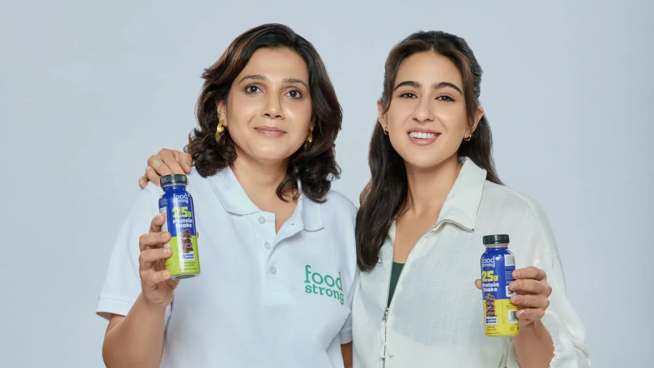 A protein scoop and a running shoe, as halftone cutouts, for Foodstrong naming Sara Ali Khan its brand ambassador