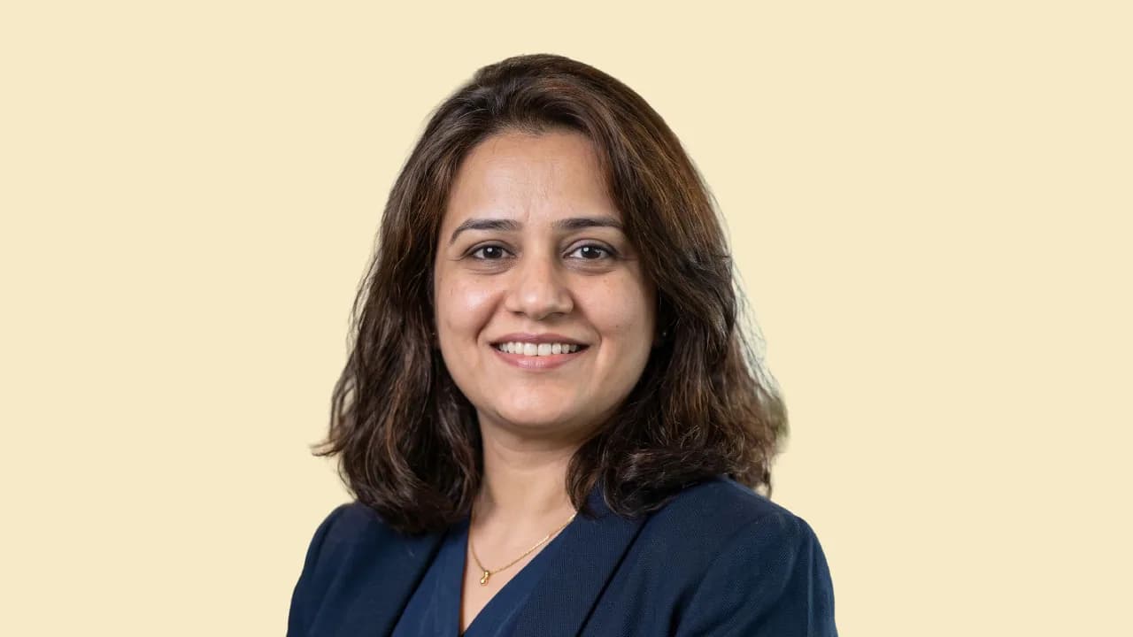 A chocolate bar and a magnifying glass, as halftone cutouts, for Tripti Mathur's AMEA integrated intelligence role at Mars