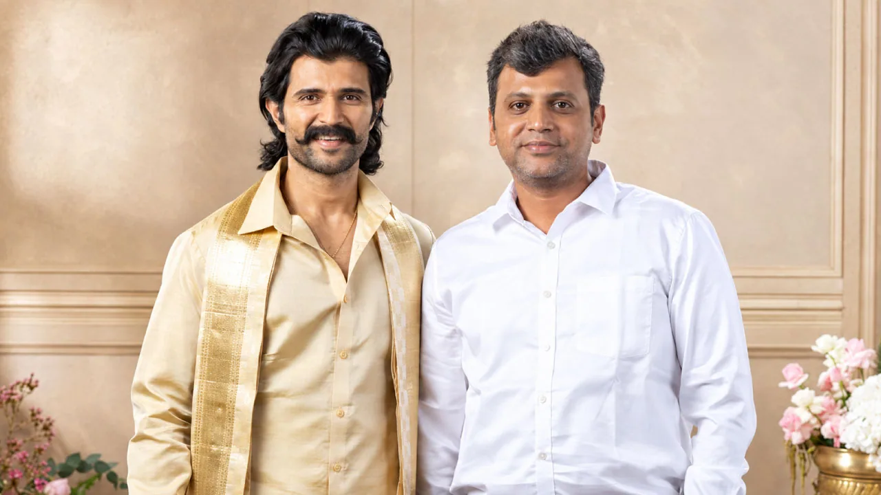 A folded length of fine cloth and a brass oil lamp, as halftone cutouts, for Vijay Deverakonda fronting Ramraj Cotton's wedding range