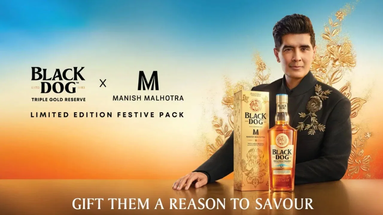 A cut-crystal whisky tumbler and an ornamented gift box, as halftone cutouts, for Black Dog's festive pack with Manish Malhotra