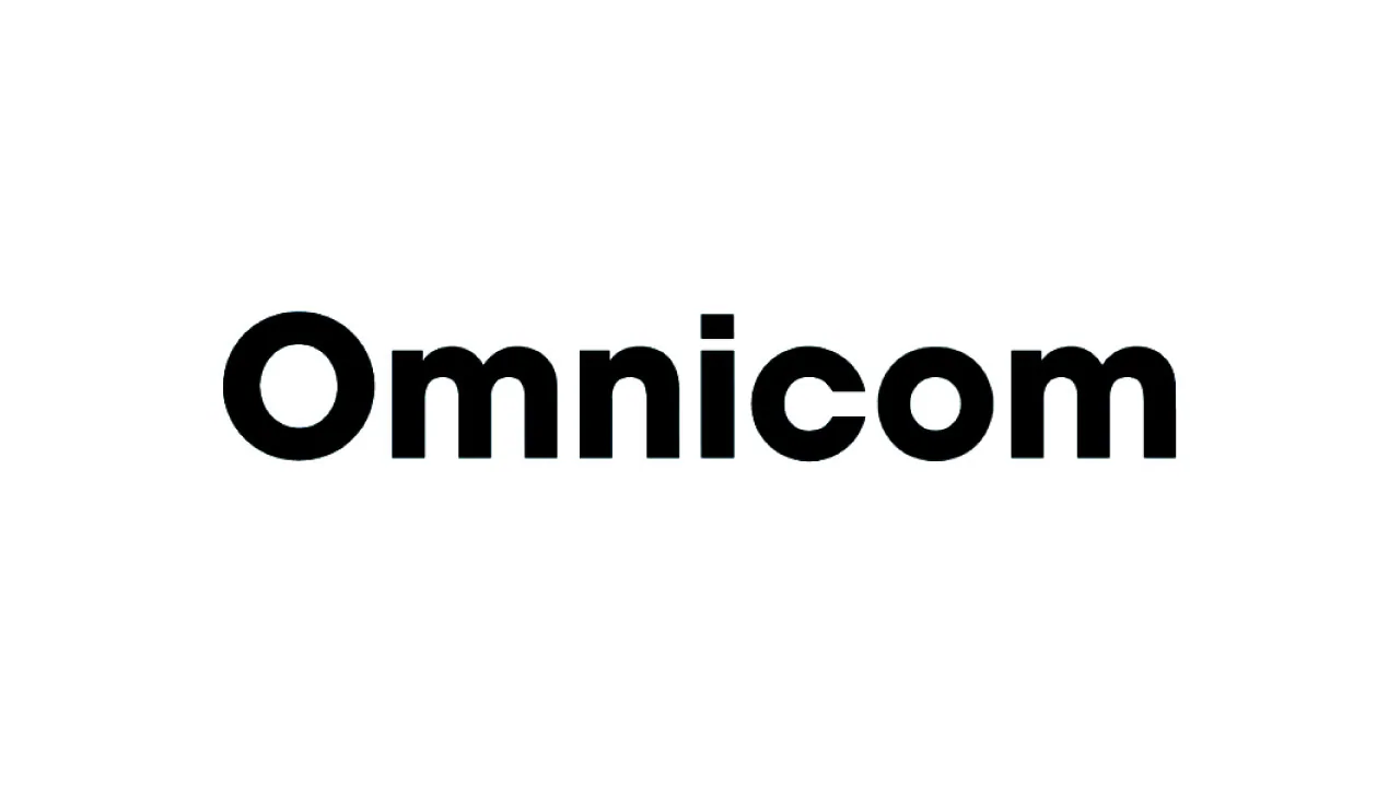 Two interlocking jigsaw pieces and a rising bar chart, as halftone cutouts, for Omnicom's Q3 2026 results after the IPG merger