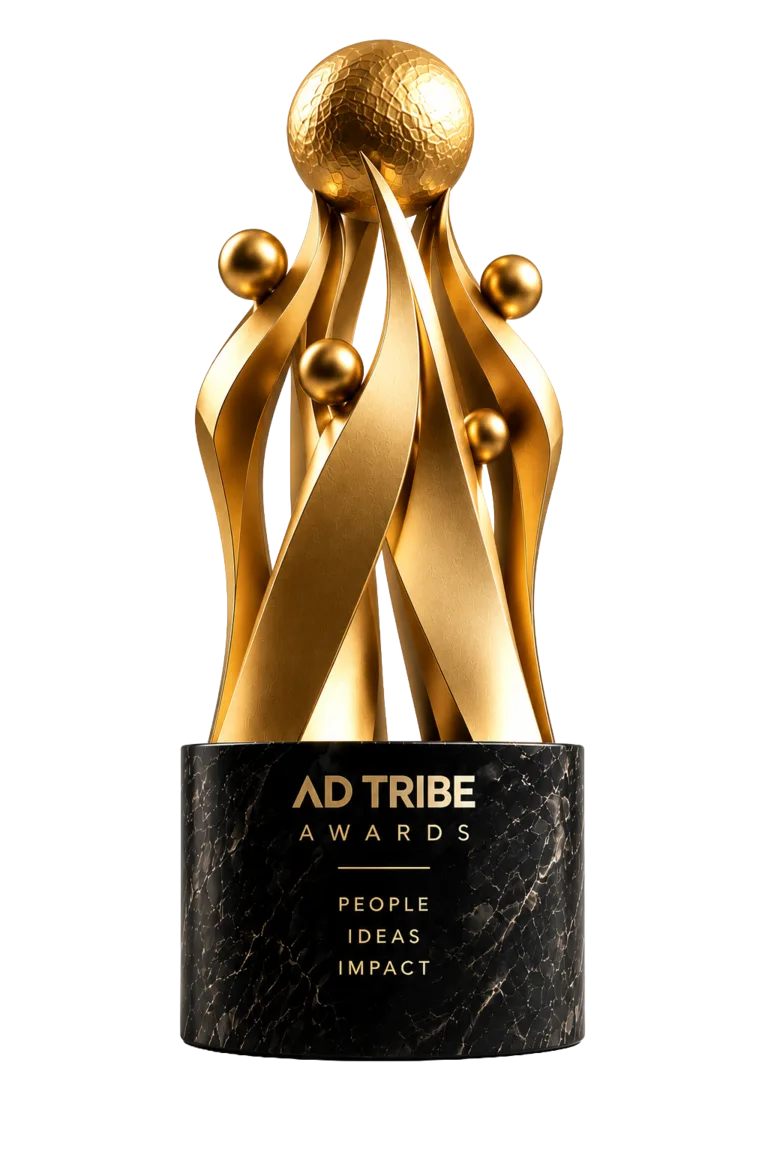 The Ad Tribe Awards South trophy in gold, on a black marble base reading People, Ideas, Impact