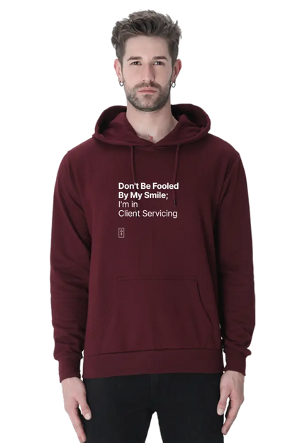 Don't Be Fooled By My Smile; I'm in Client Servicing – Premium Unisex Hooded Sweatshirt for Bold Professionals - Ad Tribe