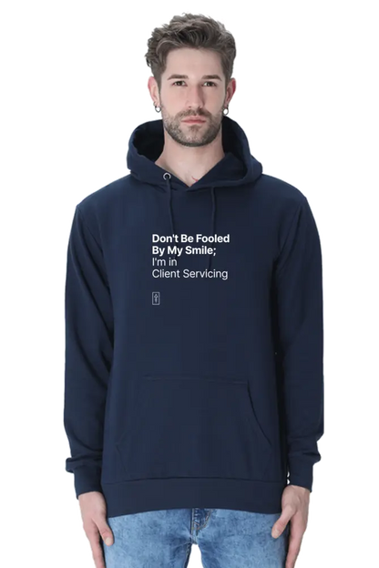 Don't Be Fooled By My Smile; I'm in Client Servicing – Premium Unisex Hooded Sweatshirt for Bold Professionals - Ad Tribe