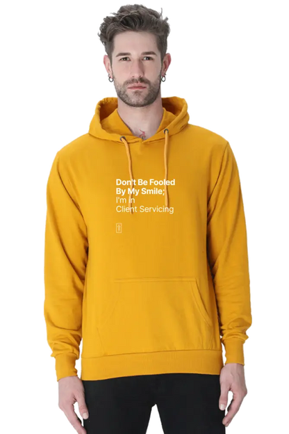 Don't Be Fooled By My Smile; I'm in Client Servicing – Premium Unisex Hooded Sweatshirt for Bold Professionals - Ad Tribe