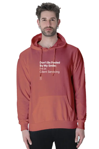 Don't Be Fooled By My Smile; I'm in Client Servicing – Premium Unisex Hooded Sweatshirt for Bold Professionals - Ad Tribe