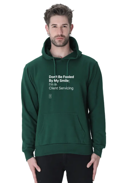 Don't Be Fooled By My Smile; I'm in Client Servicing – Premium Unisex Hooded Sweatshirt for Bold Professionals - Ad Tribe