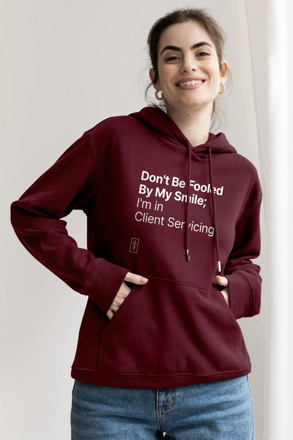 Don't Be Fooled By My Smile; I'm in Client Servicing – Premium Unisex Hooded Sweatshirt for Bold Professionals - Ad Tribe